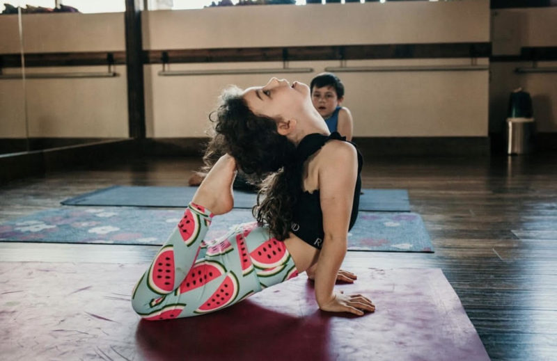 Child doing yoga