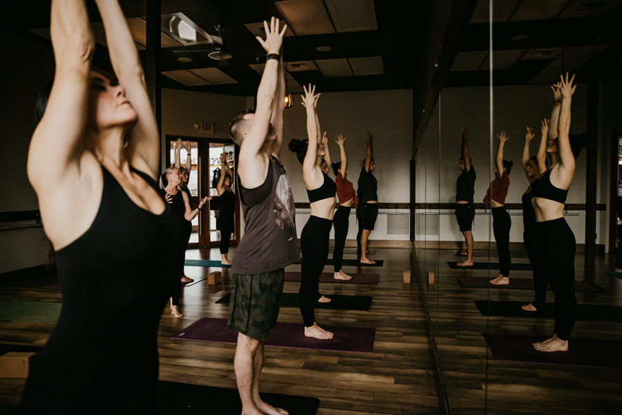 Upward mountain pose in a group class